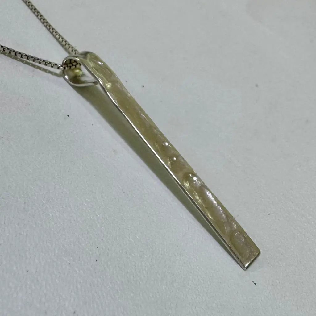 Dije en Plata lámina martillado